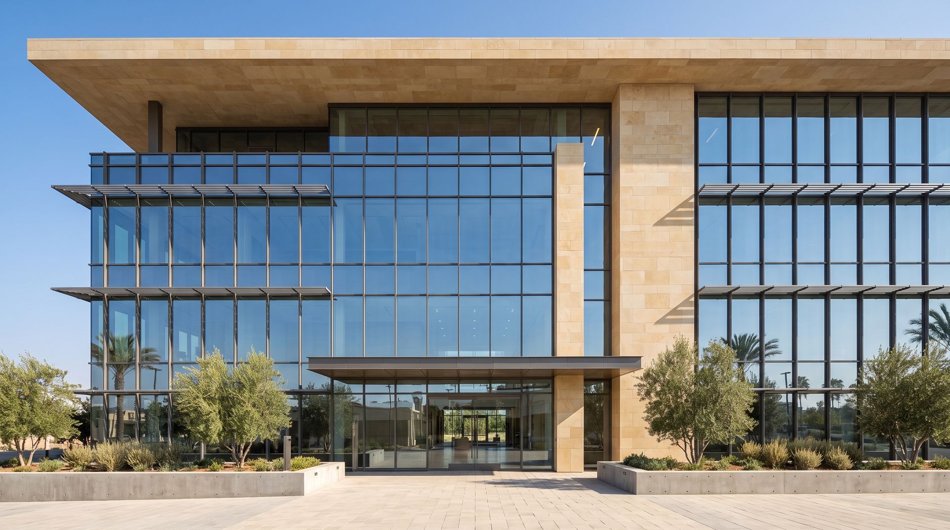 Photoreal render of the same four story office building, with the curtain wall, mullions, sunshades and entry matching the drawing