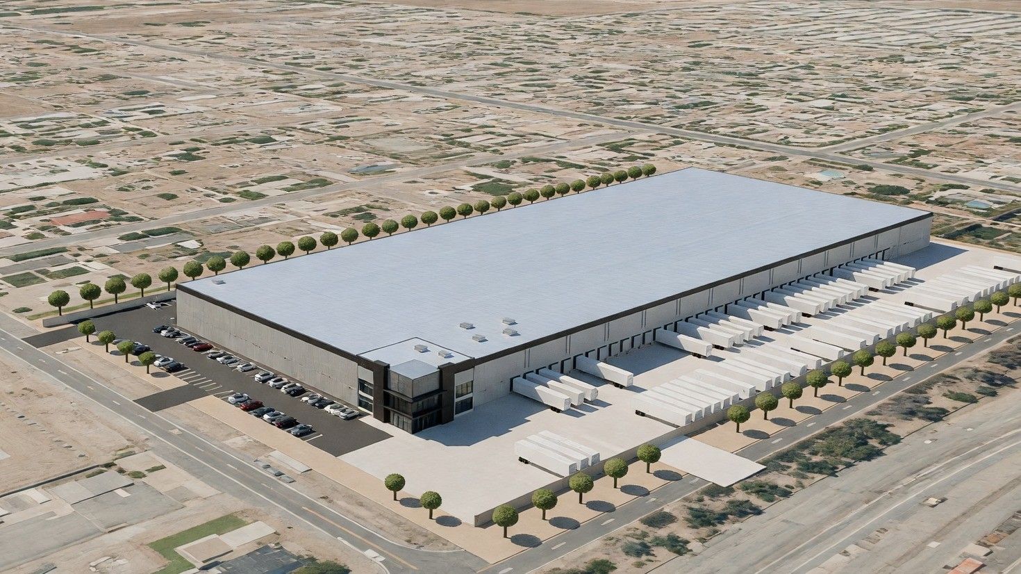 Photoreal aerial render of the same distribution building, with the truck court, trailer stalls, parking and landscape buffer laid out as the site plan shows